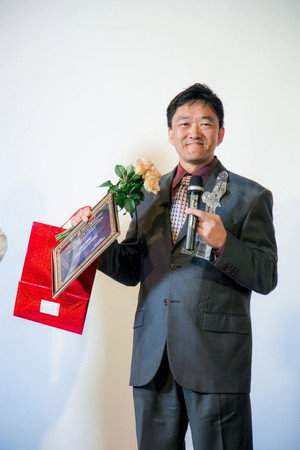 Cover image for T.J. Yoshizaki